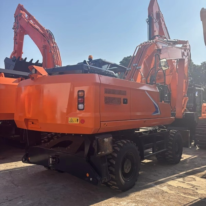 Durable Wheel Mounted Excavato - Heavy Equipment In Construction recension och pris
